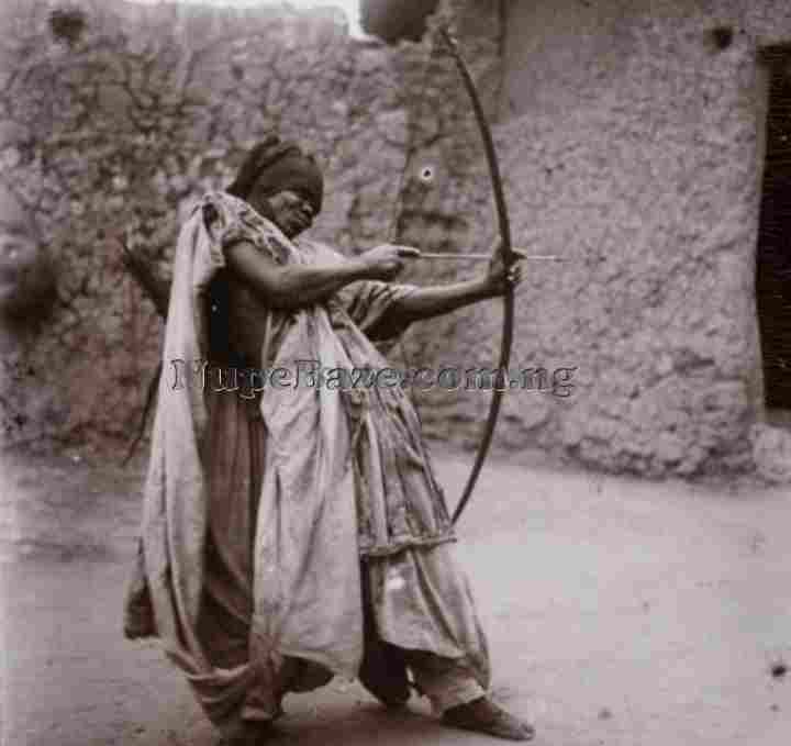 Old Picture Of Nupe Man, Holding Arch